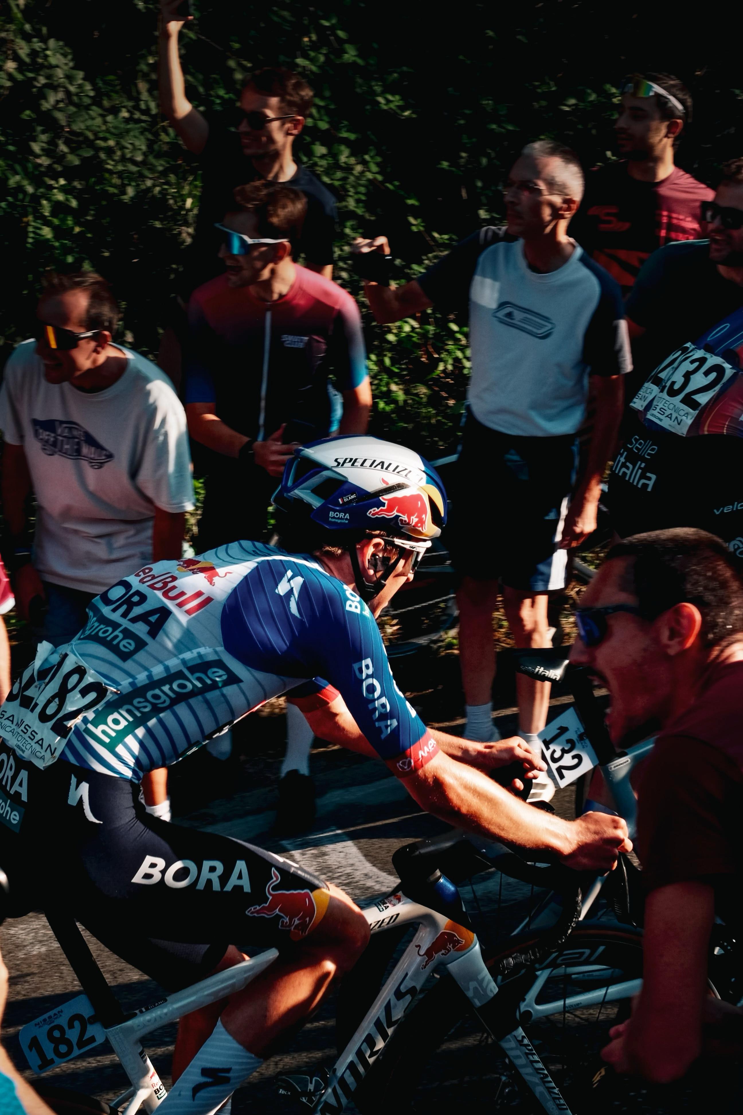 Gustave Blanc racing uphill through the crowd
